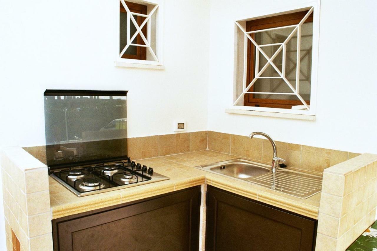 Casa Sullo Scoglio Apartment วิลลานอวา ดิ ออสตูนี ภายนอก รูปภาพ