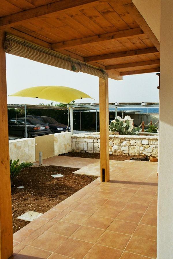 Casa Sullo Scoglio Apartment วิลลานอวา ดิ ออสตูนี ภายนอก รูปภาพ